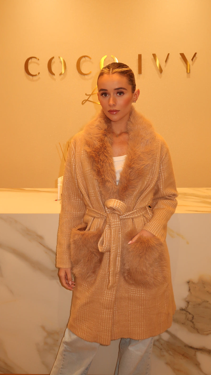 MELLY COATIGAN