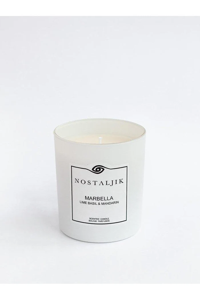Marbella Lime Basil & Mandarin candle in a glass vessel